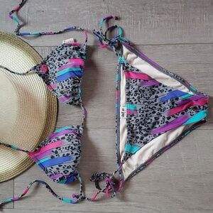 Billabong vintage suit grey cheetah and stripes.  Size Medium